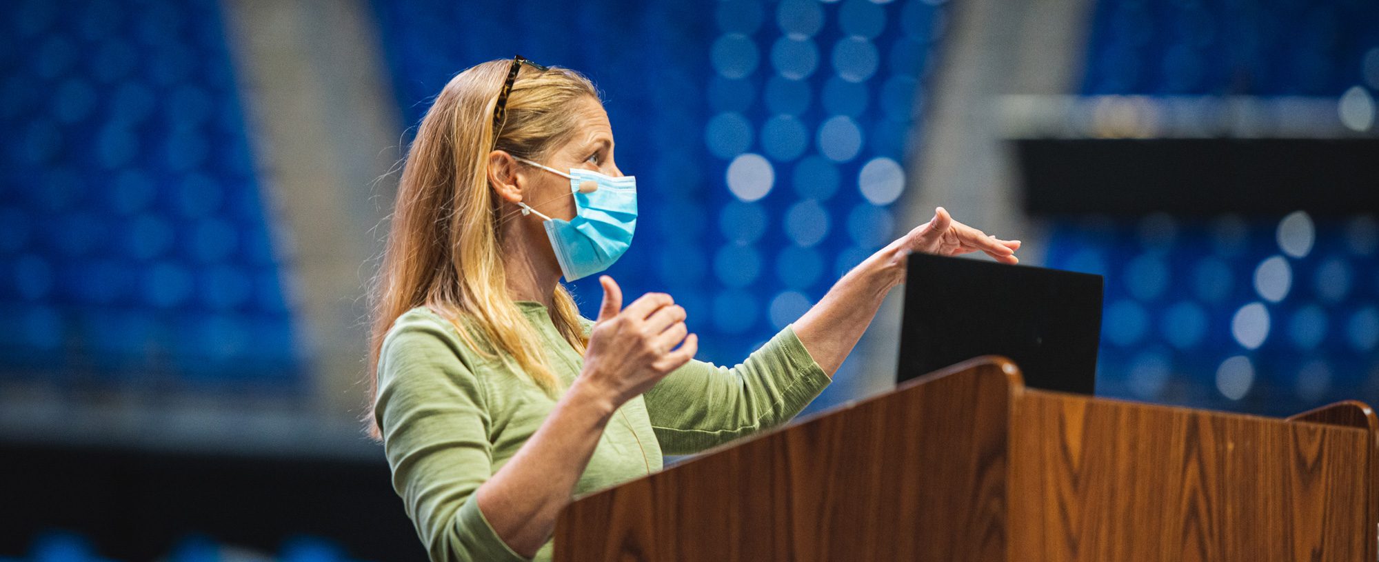 Instructor wearing mask at podium